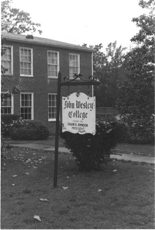 John Wesley College sign