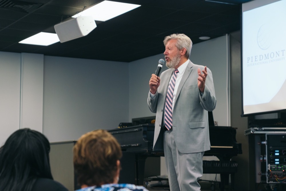 Dr Charles Petitt addressing PhD students
